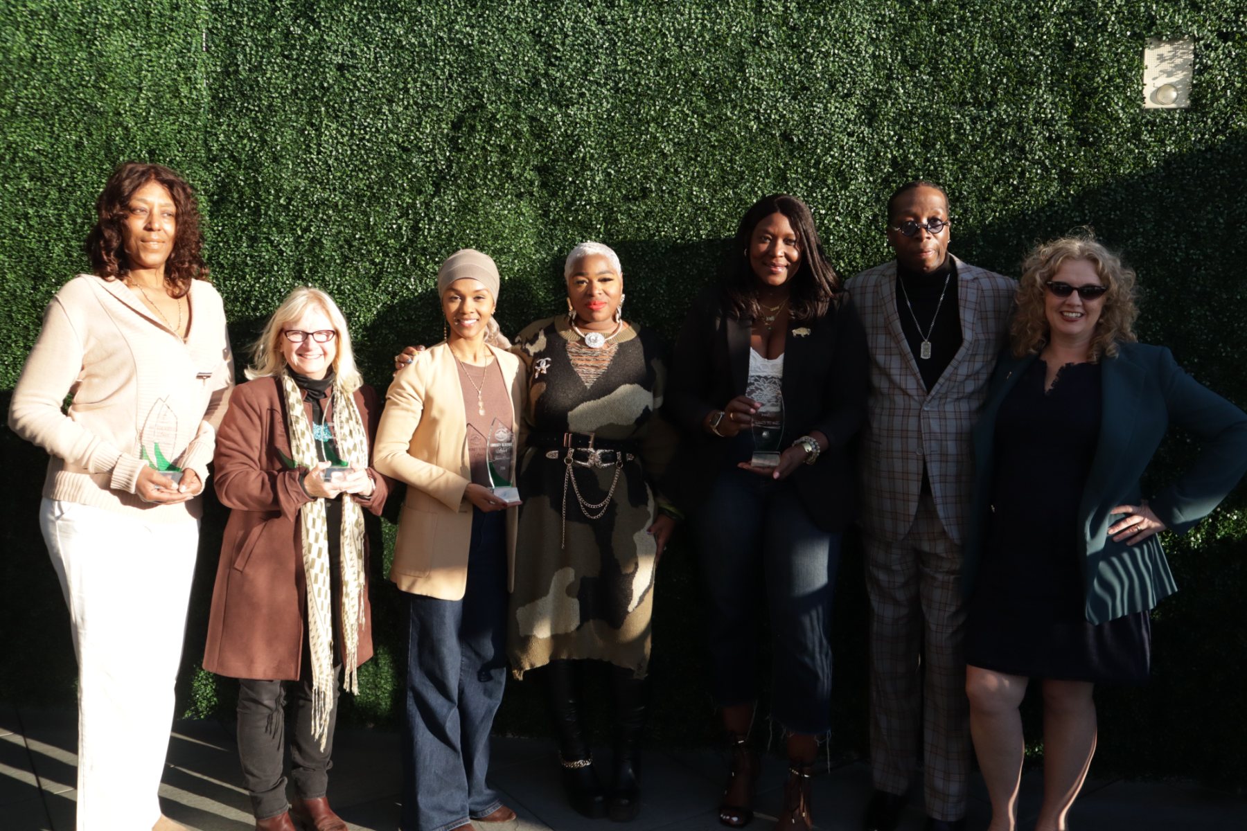 The 2026 Blueprint Award recipients holding their awards with host Chris The Mayor Thomas and the conference team on Patrick's Rooftop